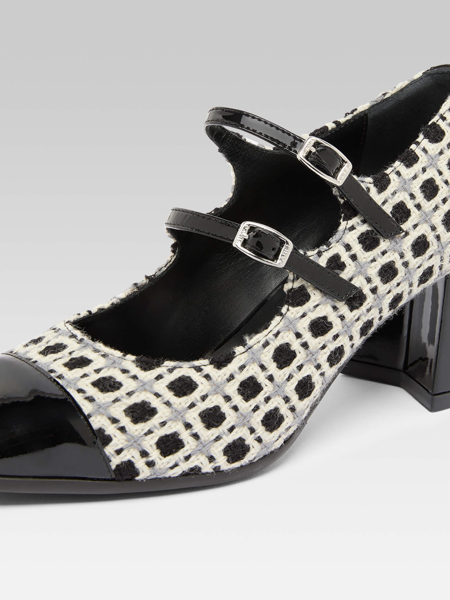 Cherry - Black and white woven and black patent leather Mary Janes pumps