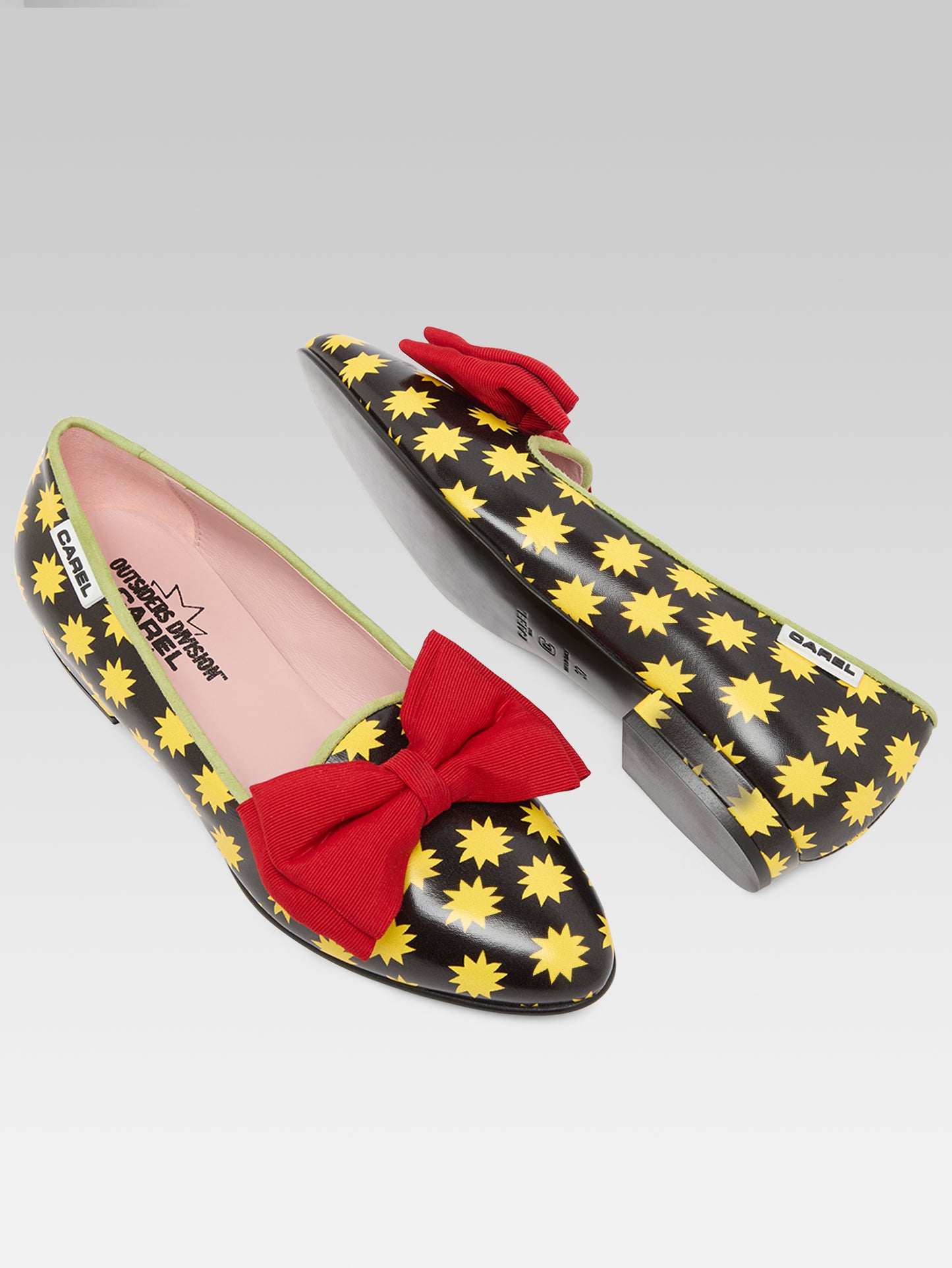 Star M - Black leather ballet flats with yellow stars and a red bow