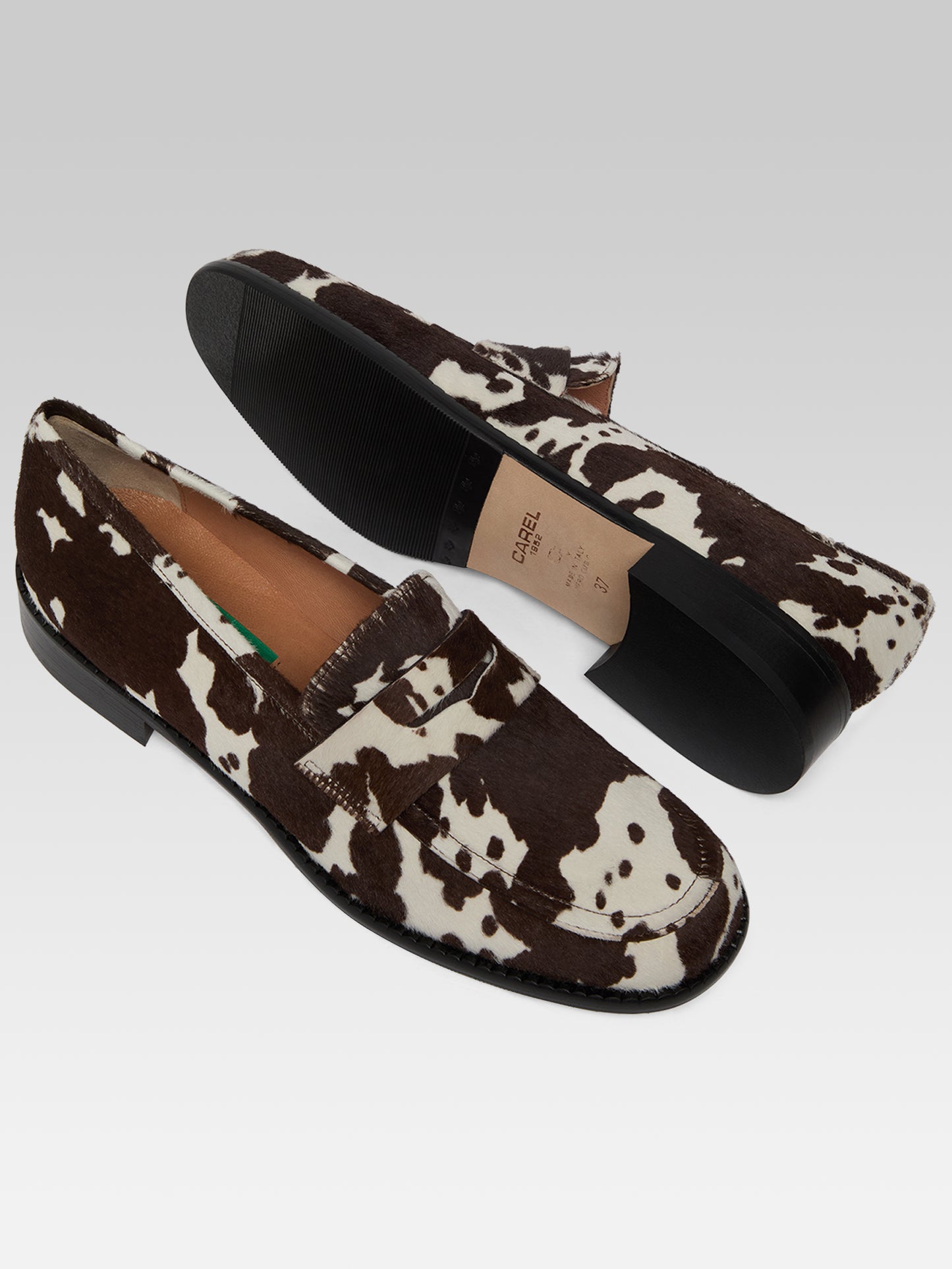 Penny - Cow print pony leather loafers