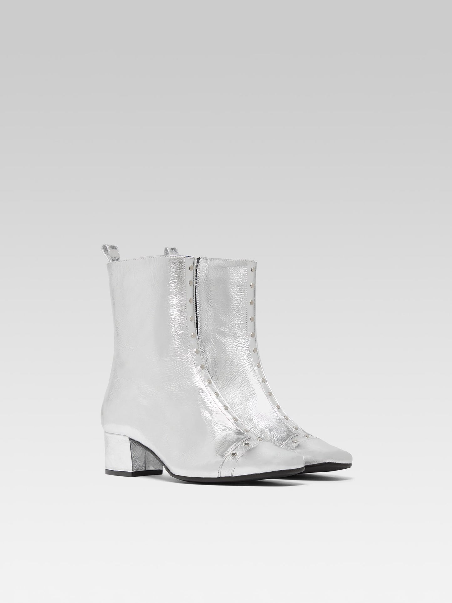 Audrey - Silver laminated leather ankle boots with studs