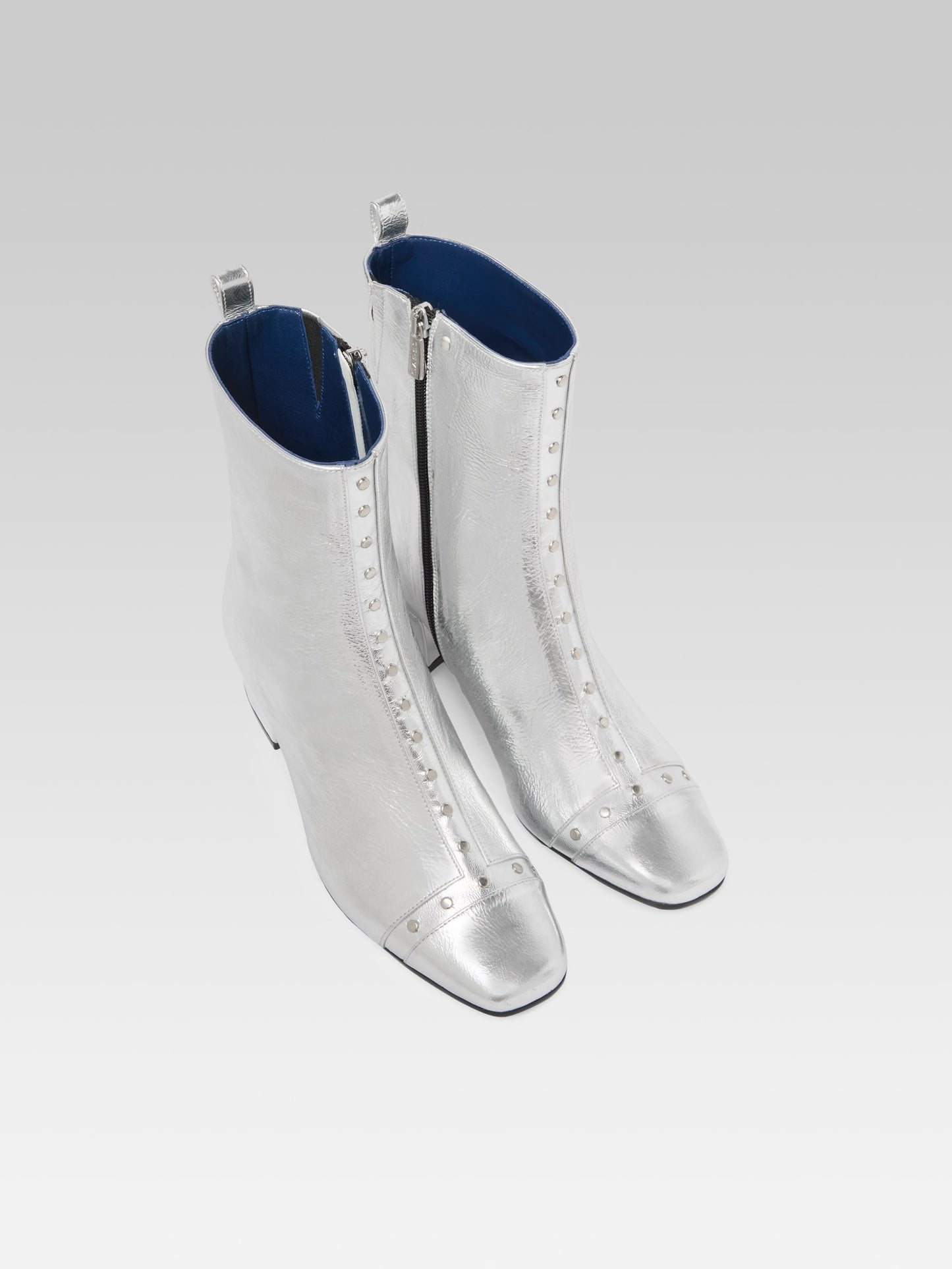 Audrey - Silver laminated leather ankle boots with studs