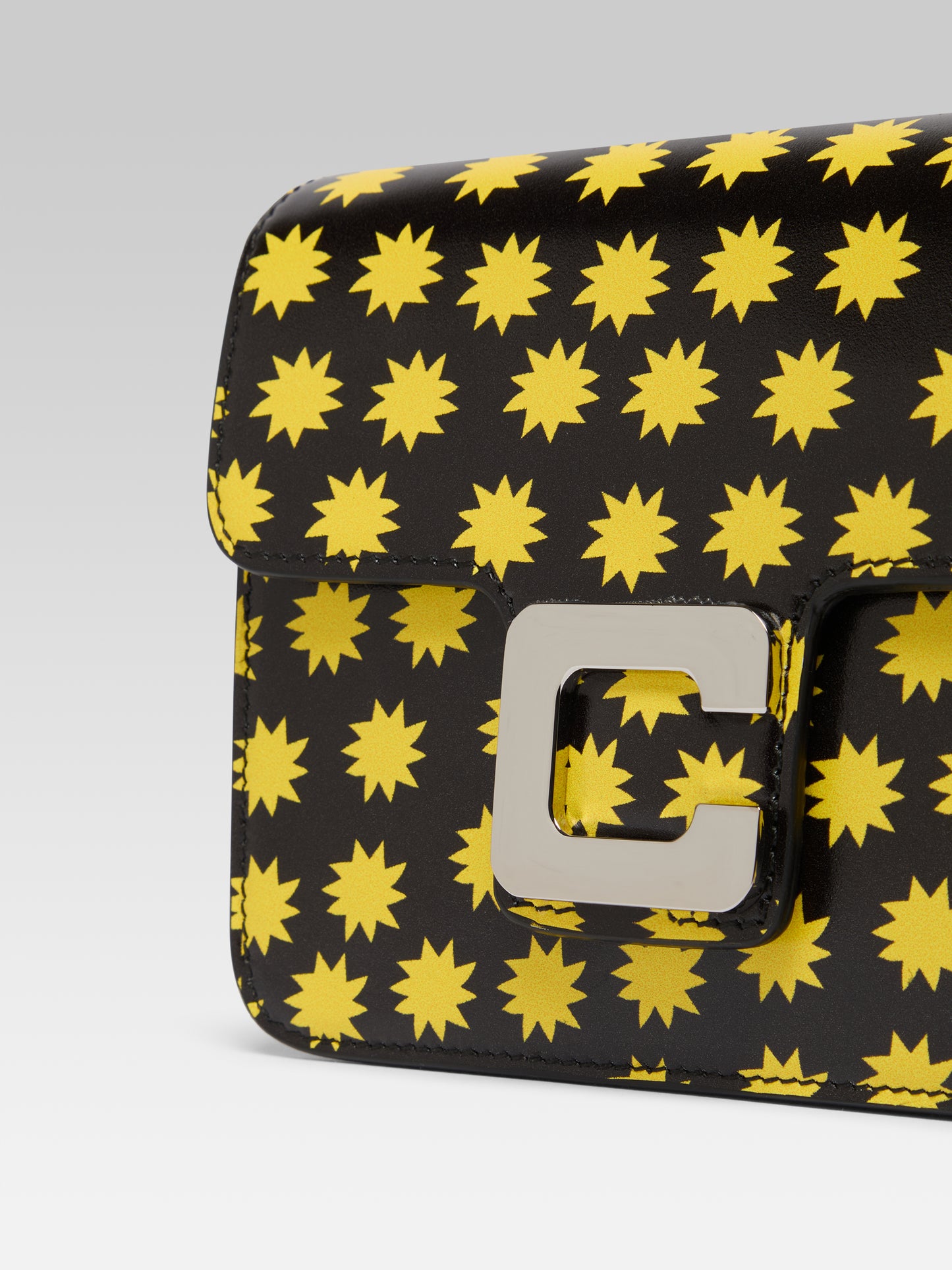 Star M - Sac cuir noir et étoiles jaunes