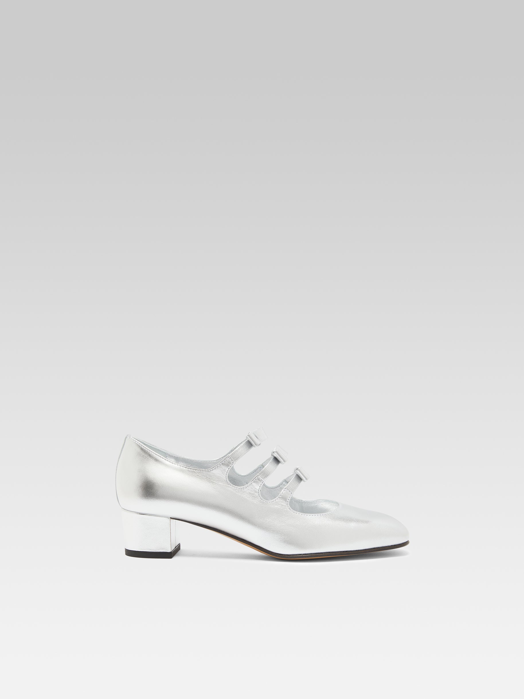 Kinette - Mary janes pumps with bows in silver laminated leather
