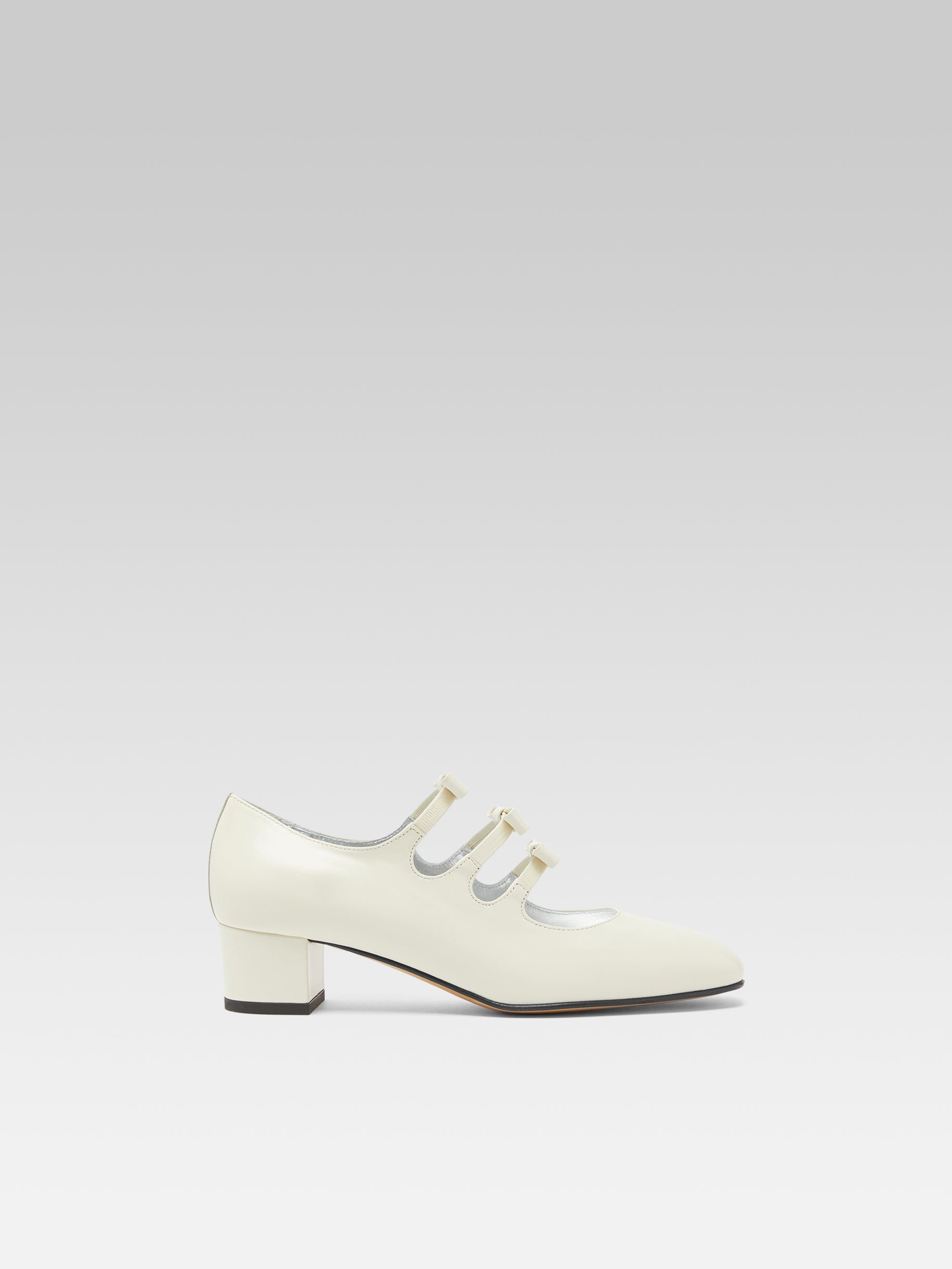 Kinette - Mary janes pumps with ivory leather bows - Image number 1