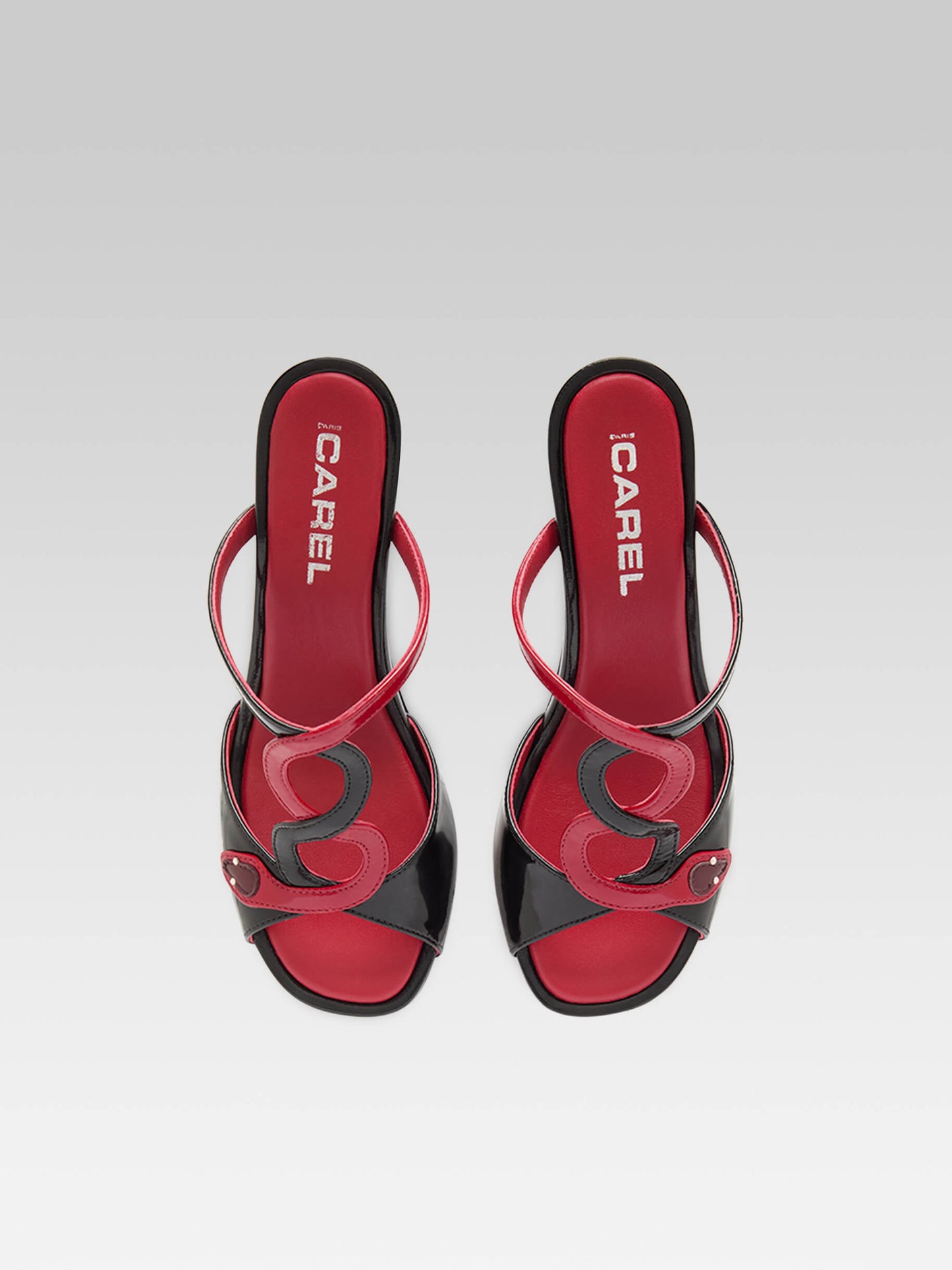 Naja - Mules à talon serpent cuir verni noir et rouge