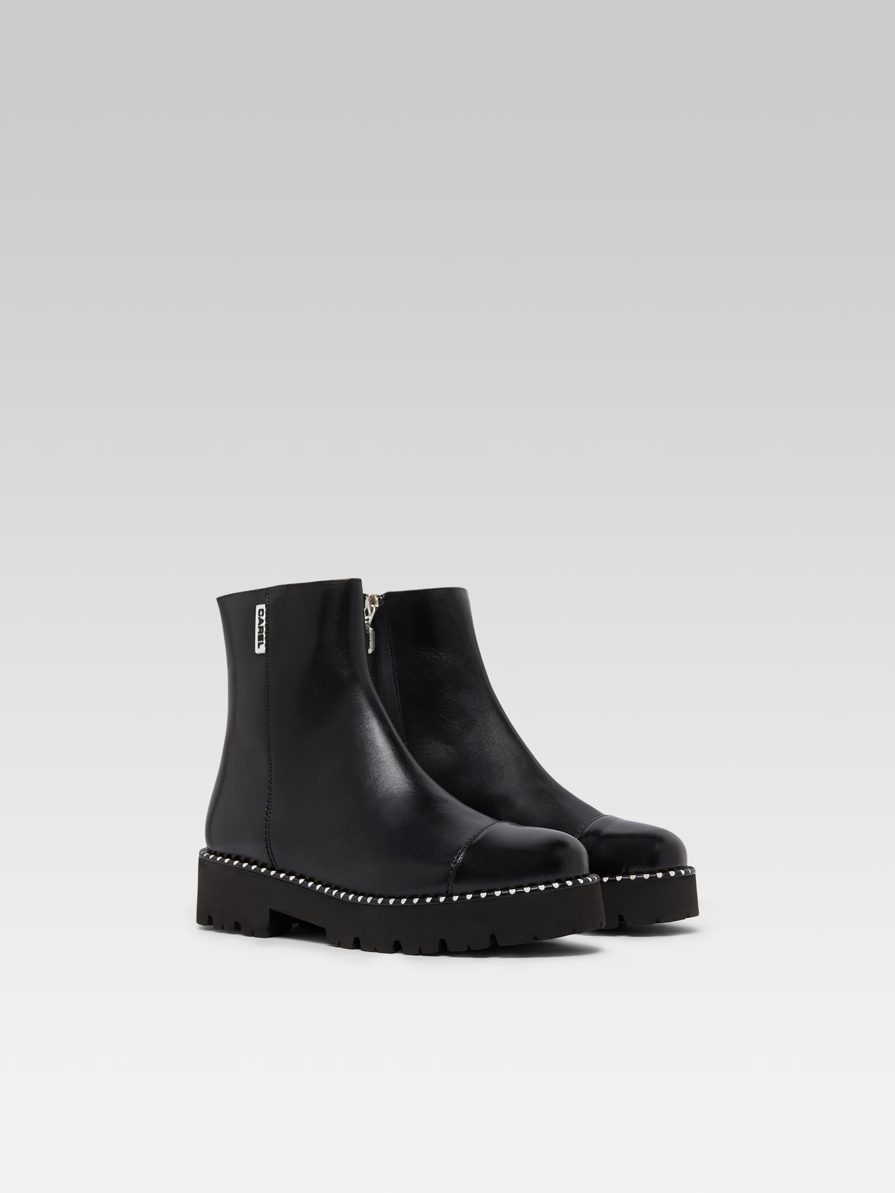 Chouchou - Black leather and glossy leather ankle boots with stitching - Image number 2