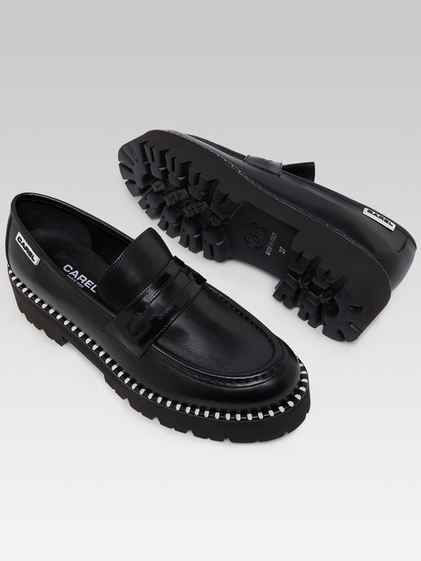 Marion - Black leather and glossy leather loafers with stitching