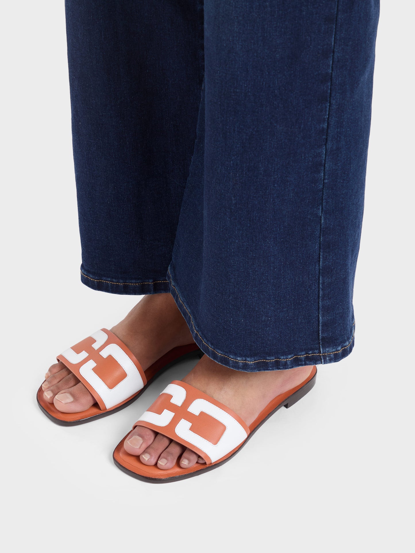 Brasilia - Orange and white leather flat mules