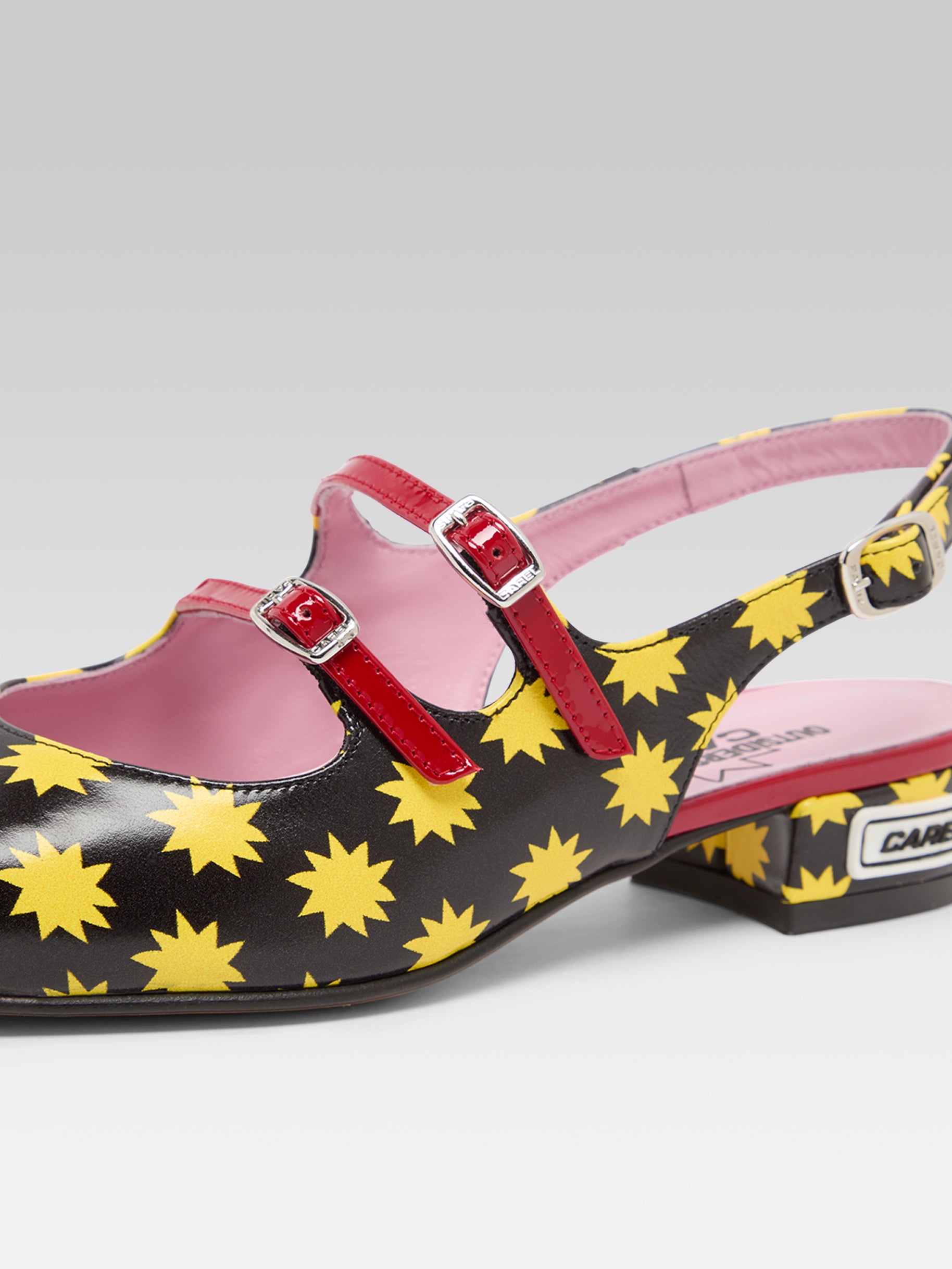 Star P - Black leather slingback Mary Janes with yellow stars