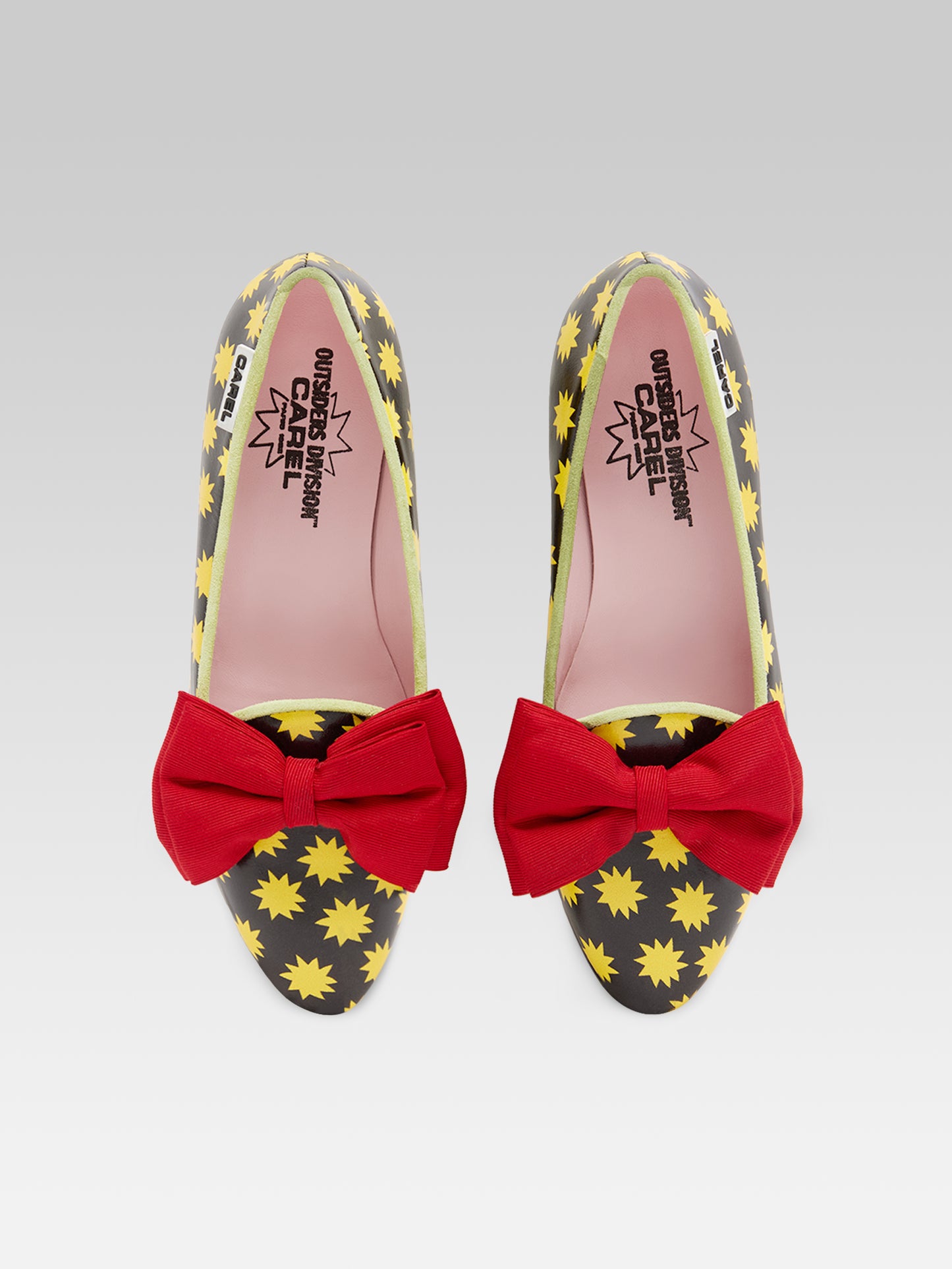 Star M - Black leather ballet flats with yellow stars and a red bow