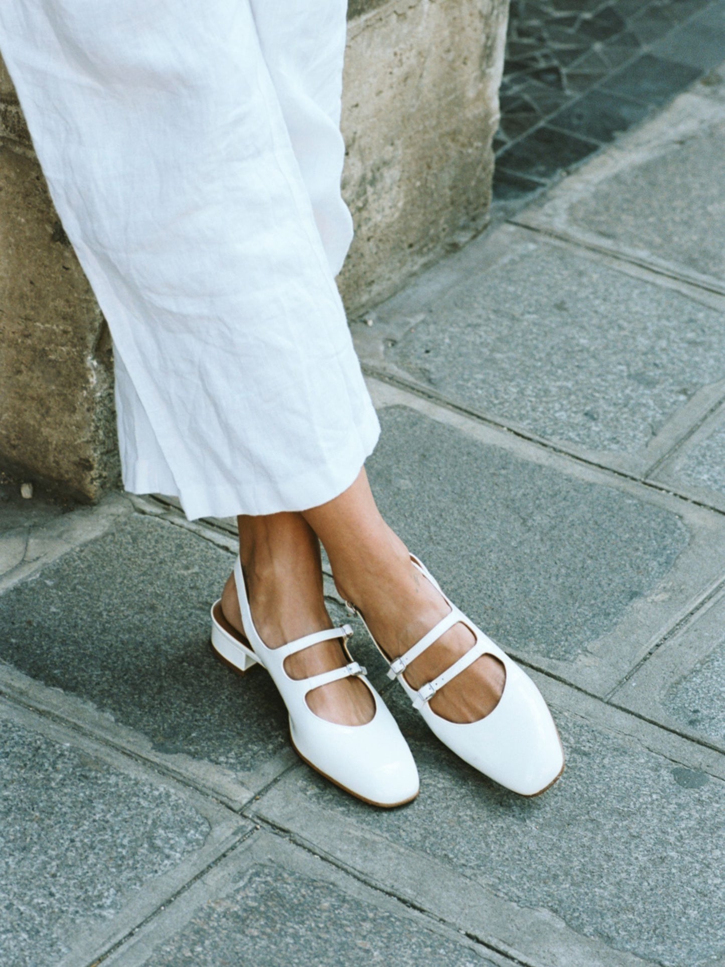 Peche - White patent leather slingback Mary Janes