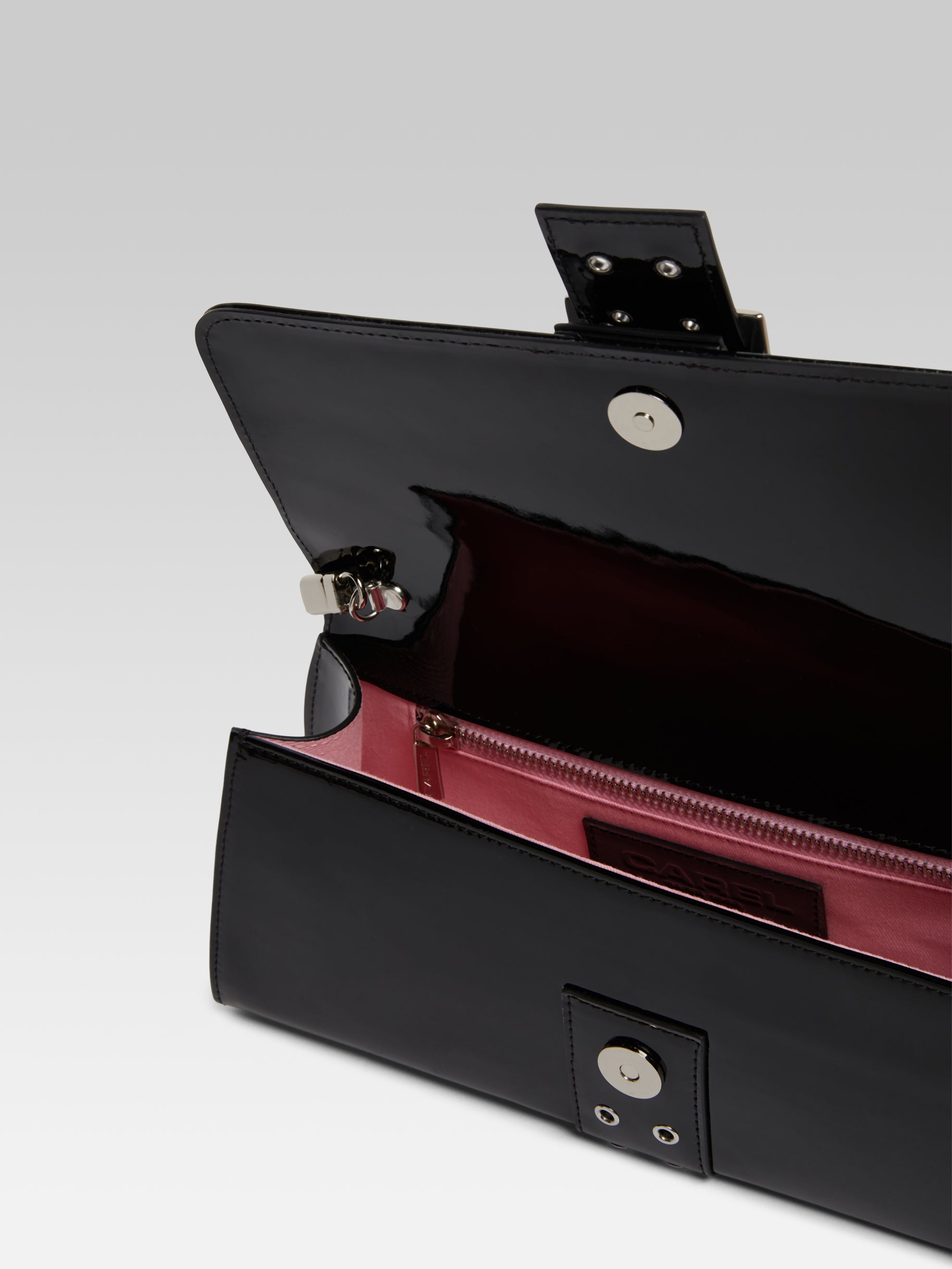 Maddie Black patent leather shoulder bag with eyelets