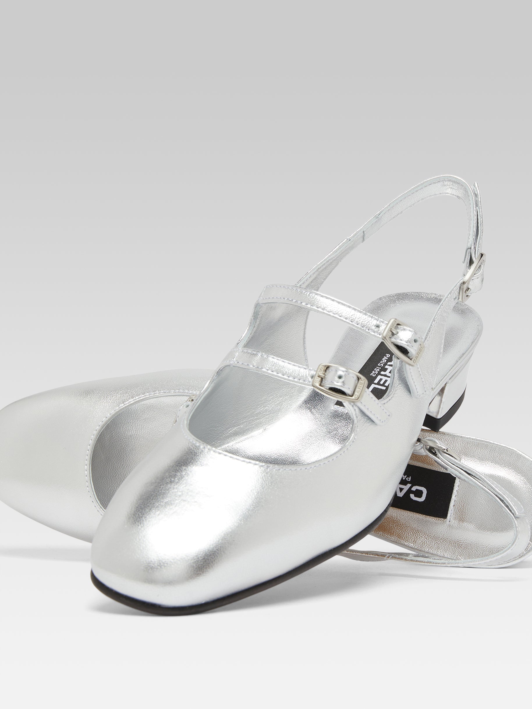 Peche - Silver laminated leather slingback Mary Janes